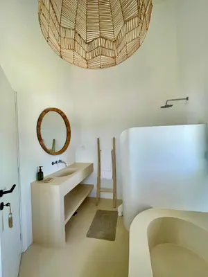a bathroom with a sink and a mirror at Casa Oliva do Sul in Almancil