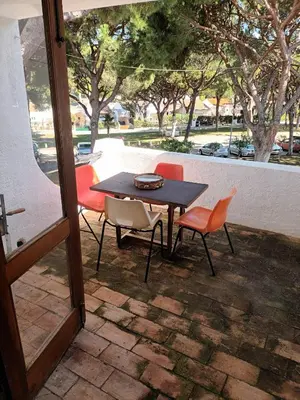 a table and chairs sitting on a patio at Studio Açoteias 410 in Albufeira