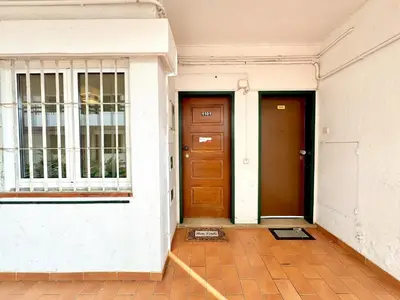 two doors on the side of a building at Vilamoura Downtown by Homing in Vilamoura