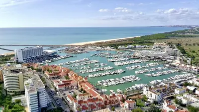 an aerial view of a harbor with boats in the water at Vilamoura Marina Beach With Pool by Homing in Vilamoura