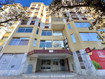 a tall building with the front of it at Quarteira Central 3 by Homing in Quarteira