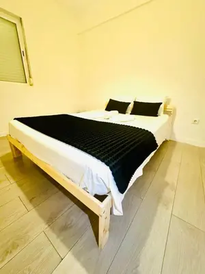 a bedroom with a large bed in a room at Amazing Space - 4 Bedroom in Albufeira