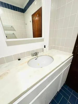 a bathroom with a sink and a mirror at Apartment in Vilamoura Park in Quarteira