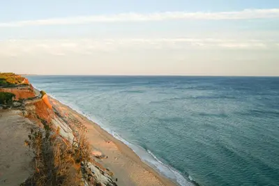 an aerial view of a beach and the ocean at Pine Cliff Apartment by The Portuguese Butler in Olhos de Água