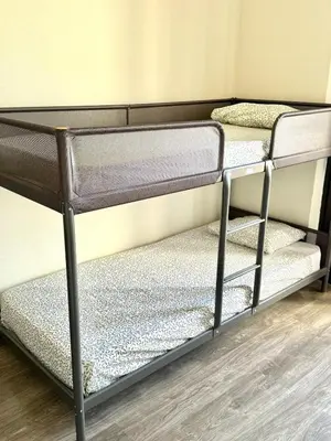 a couple of bunk beds in a room at Fabulous Praia dos Pescadores in Albufeira