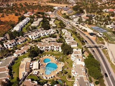 an aerial view of a resort with a pool at Lovely 3 Bedroom Home in a Resort in Albufeira in Albufeira
