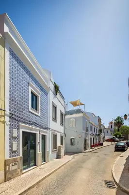 a street in a town with white buildings at BLQ Charneco 1BDR in Boliqueime by LovelyStay in Boliqueime