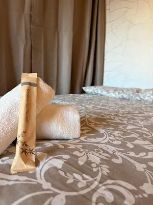 a bandaged up limb sitting on top of a bed at Cozy and chic apartment in Albufeira