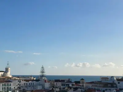 a view of a city with the ocean in the background at Panorama Old Town sea view Albufeira in Albufeira