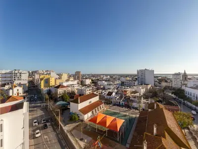 an aerial view of a city with buildings at Akisol Faro Virtuous in Faro
