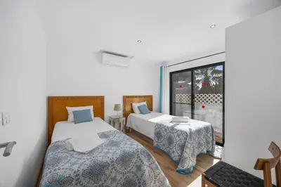 a kitchen and dining room with a table and chairs at Joliet in Vilamoura