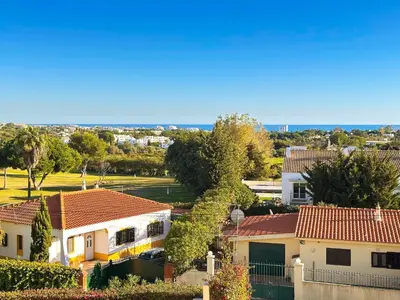 arial view of a house in a suburb at Balaia Poolside House with Sea View by BeCherish in Atalaia