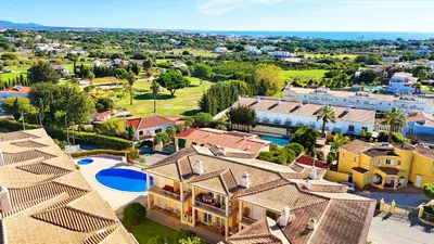 an aerial view of a villa with a resort at Balaia Maggs House Pool & Ocean view by BeCherish in Albufeira