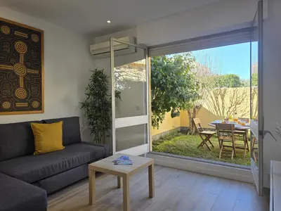 a bedroom with two beds and a window at Barca do Lago Oasis by SAPvillas in Quarteira