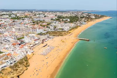 an aerial view of a beach and the ocean at Rocco del Mar by Portucasa in Albufeira