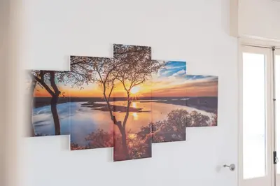 a cross painting of a river and trees at Cosy 2Bdr Flat in Faro Downtown by LovelyStay in Faro