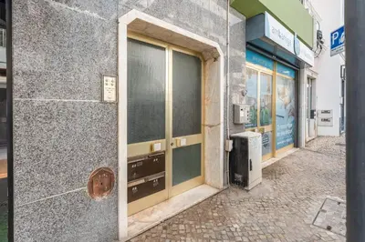 a door to a building on a street at Cosy 2Bdr Flat in Faro Downtown by LovelyStay in Faro