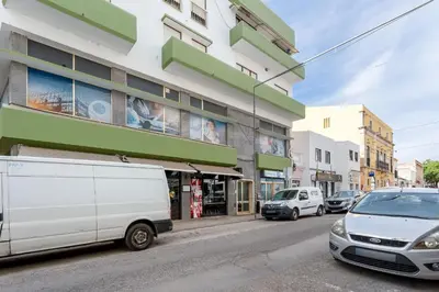 a white van parked in front of a building at Cosy 2Bdr Flat in Faro Downtown by LovelyStay in Faro