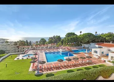 an aerial view of a resort with a swimming pool at Relaxing studio in Albufeira Jardim in Albufeira