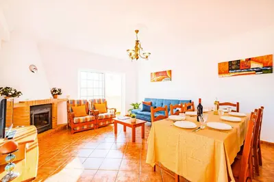 a white bathroom with a sink and a shower at Villa Atlantis by Algarve Vacation in Guia