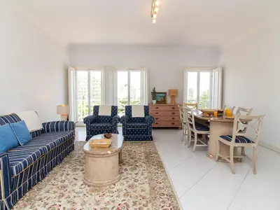 a view of a city street with cars and buildings at Vilamoura Sea View Apartment by Stay ici Algarve Holiday Rental in Quarteira