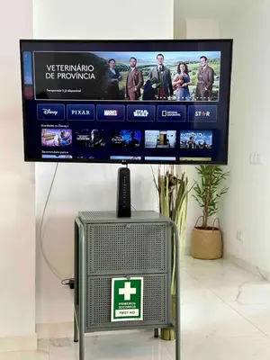 a television with a website on a wall at Seaside Inspire Wilderness in Quarteira
