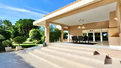 an image of a house with a patio at Villa Albatros Cleverdetails, Vilamoura, private pool and jacuzzi in Vilamoura