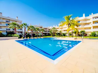 a large swimming pool in front of a building at Condo-Pool walk to the Beach by Algarve Dream Holidays in Albufeira
