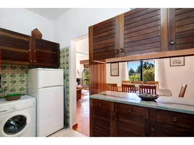 a kitchen with a refrigerator and a dishwasher at Holiday Home Casa Mila - Sunny Way by Interhome in Albufeira