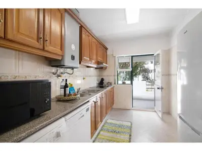 a dining room and living room with a table and chairs at Apartment Jade-Sunny Way by Interhome in Albufeira