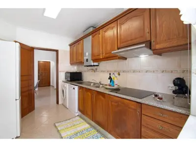 a kitchen with a sink and a washing machine at Apartment Jade-Sunny Way by Interhome in Albufeira