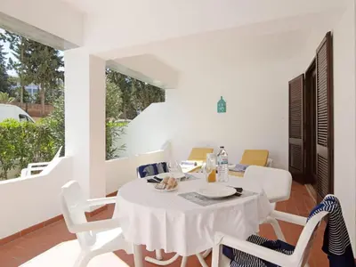 a bedroom with a bed and a window at Apartment Joyce - Sunny Way by Interhome in Albufeira