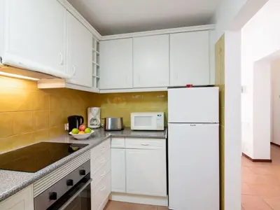 a living room with a couch and a table at Apartment Joyce - Sunny Way by Interhome in Albufeira