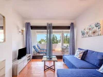 a kitchen with a microwave and a counter top at Apartment Lima - Sunny Way by Interhome in Albufeira