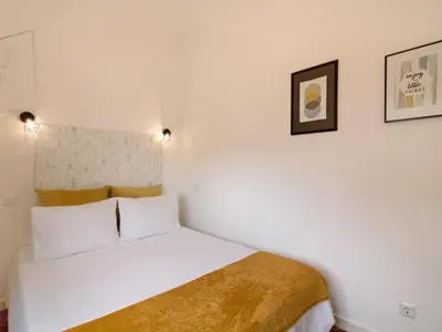 a white bathroom with a toilet and a sink at Apartment Medusa - Sunny Way by Interhome in Albufeira