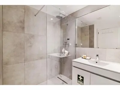 a bathroom with a shower and a sink at Apartment Max Tropical - Sunny Way by Interhome in Albufeira
