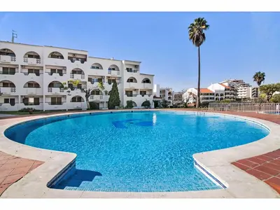 a large swimming pool in front of a building at Apartment Max Tropical - Sunny Way by Interhome in Albufeira