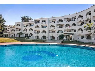 a swimming pool in front of a building at Apartment Sunlight Albufeira - Sunny Way by Interhome in Albufeira