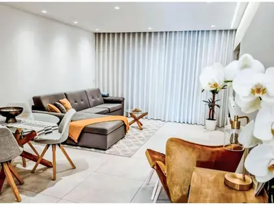 a living room with a couch and a table at Apartment Sunlight Albufeira - Sunny Way by Interhome in Albufeira