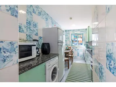 a kitchen with a refrigerator and a dishwasher at Apartment W Marina - Sunny Way by Interhome in Albufeira