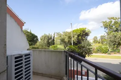 a balcony with a fence and a street at Marina Búzios I & II - Vilamoura Marina by HD in Vilamoura