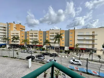 a view of a parking lot with buildings and cars at Vilamoura Central Beach 1 With Pool by Homing in Vilamoura