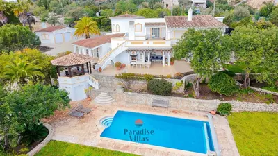 an aerial view of a mansion with a swimming pool at 7 Bedrooms, Main House, Bungalow, Private Pool in Fonte da Murta
