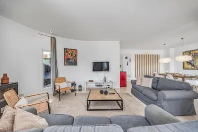 a living room with a couch and a table at Villa Gale by Vintage Travel in Galé