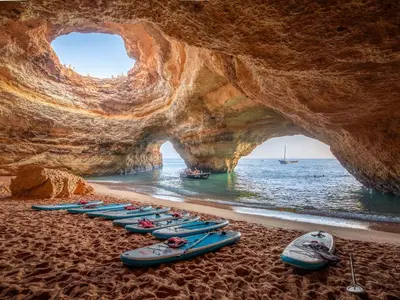 a group of kayaks are lined up on the beach at Holiday Home Aldeia Do Mar by Interhome in Vilamoura