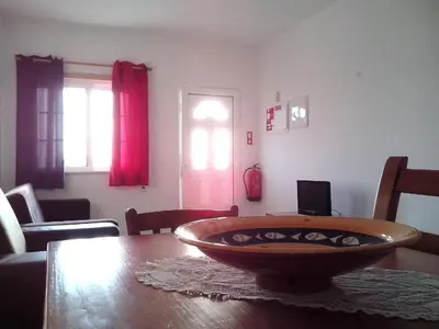a dining room table with a bowl on top of it at Apartment mit Balkon by Interhome in Albufeira
