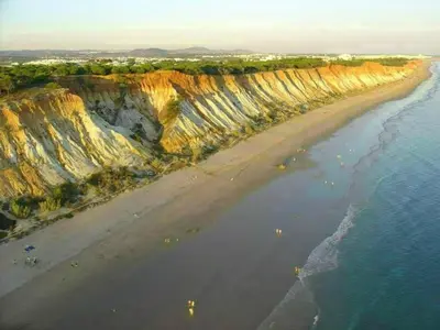 an aerial view of a beach with cliffs and the ocean at Apartment mit Terrasse by Interhome in Albufeira