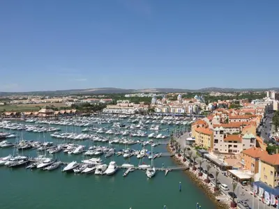 an aerial view of a harbor with boats in the water at Apartment mit Terrasse by Interhome in Albufeira