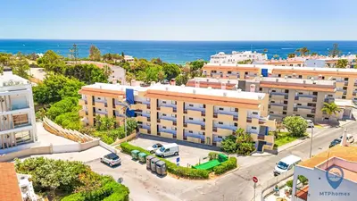 an aerial view of a city with the ocean at Bordalo by MTPhomes in Albufeira