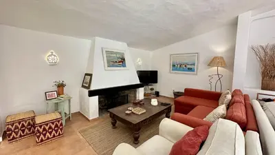 a kitchen and dining room with a marble table and chairs at Villa Morocco with Heated Private Pool for 12 Guests in Albufeira in Albufeira